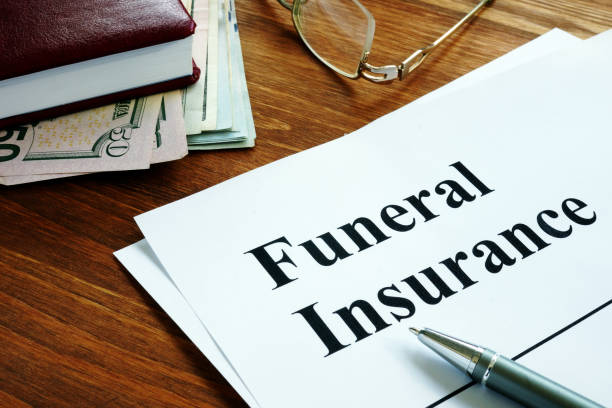 Funeral insurance agreement, money and glasses. Funeral insurance agreement, money and glasses.